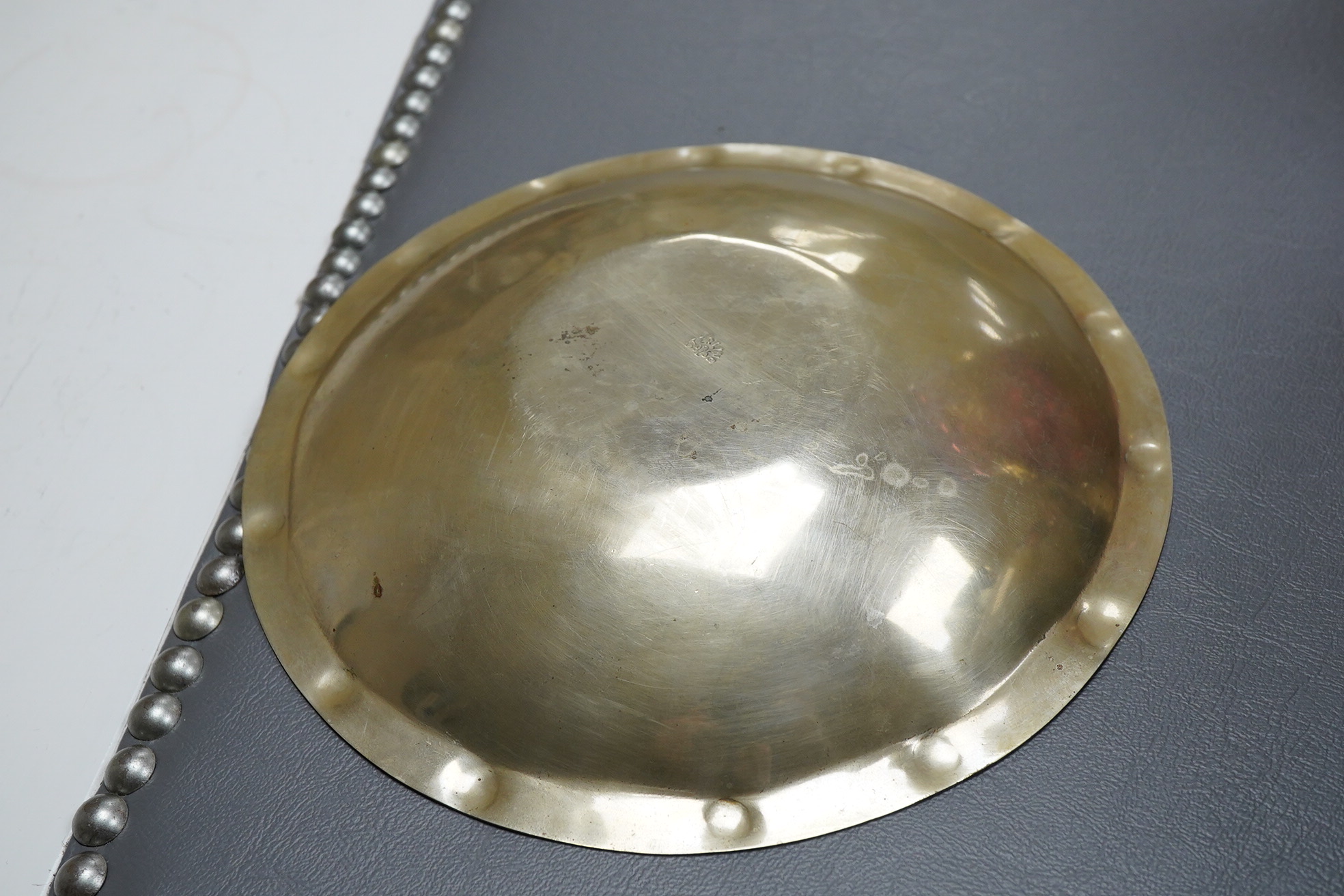 A Mexican sterling 925 dish, the centre embossed with the Aztec Sun Stone, diameter 18.7cm, 6.7oz.